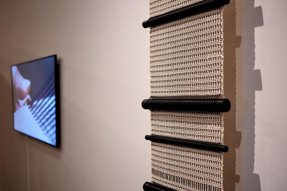 Caption : Weaving Code #20210625. Exhibition view, Henry Van de Velde Awards, Bozar, Brussels, February 2023. Credit : Sam Gilbert for Flanders DC